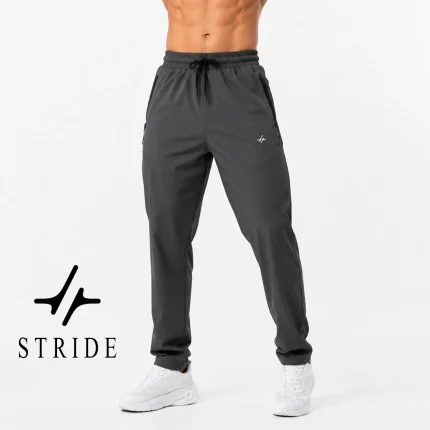 شلوار ورزشی مردانه جریان مدل STRIDE رنگ طوسی با فرم راسته